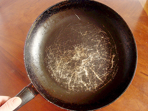 A Scratched-Up Nonstick Pan Toss or Keep